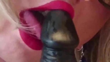 Licking black dildo