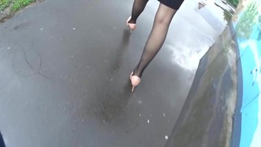 Following candid woman in black pantyhose and high heels